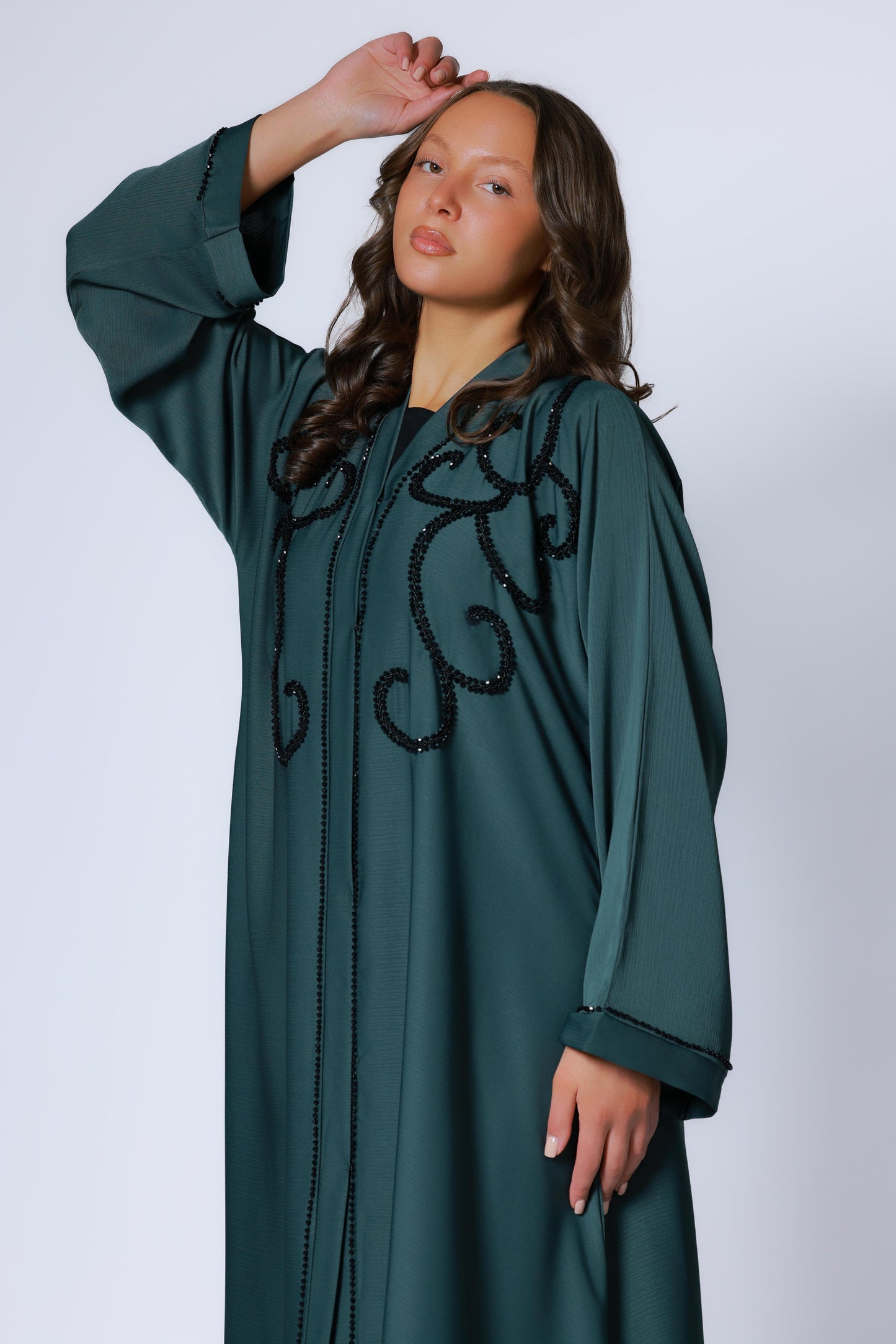 Donkergroene abaya met prachtige zwarte steentjes